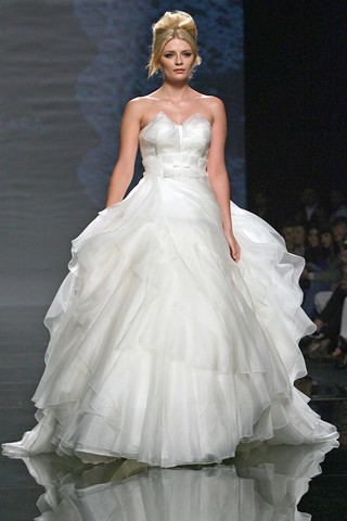 gown in pleated organza for Rosa Clara the renowned wedding dress maker